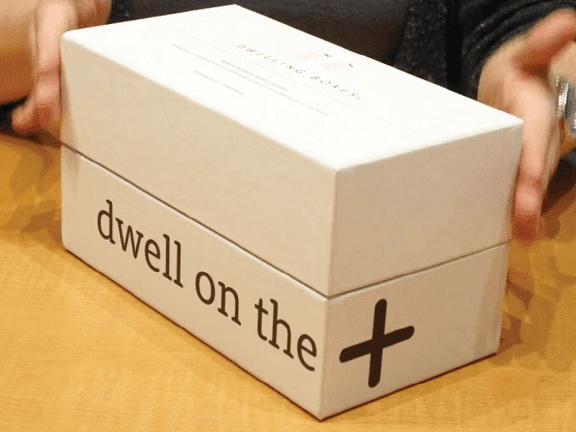 white base and lid box with wrap around screenprinting decoration in serif typeface